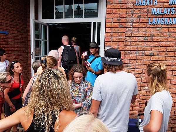 Telaga Terminal Staff Distributing Passport