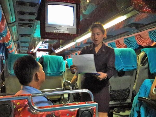 Bus stewardess  in Choke Anan Tour