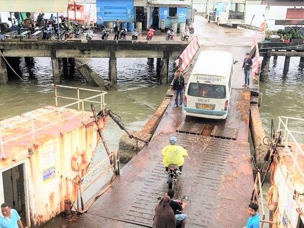 Vehicle and motorbike drive off ferry Vehicle and motorbike drive off ferry